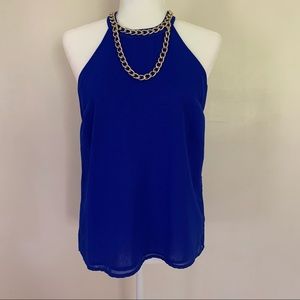 Royal blue blouse with gold chain. Racer back.